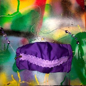 Purple “Zip the lips” face mask with mask holder